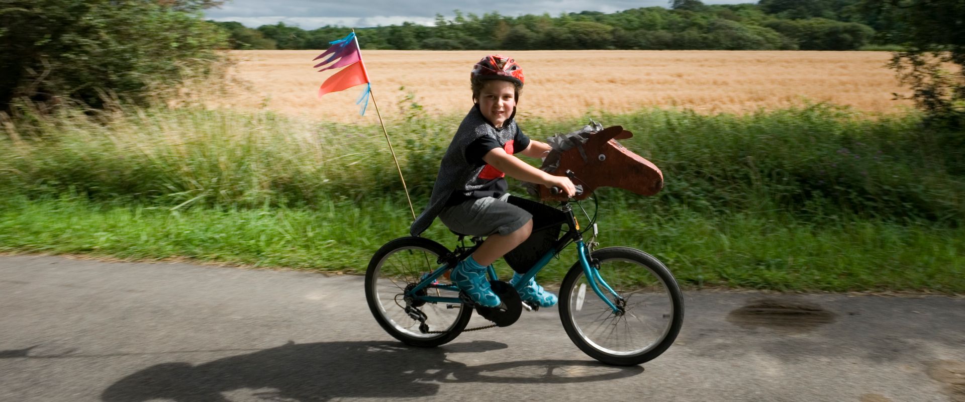A child on their horcycle.